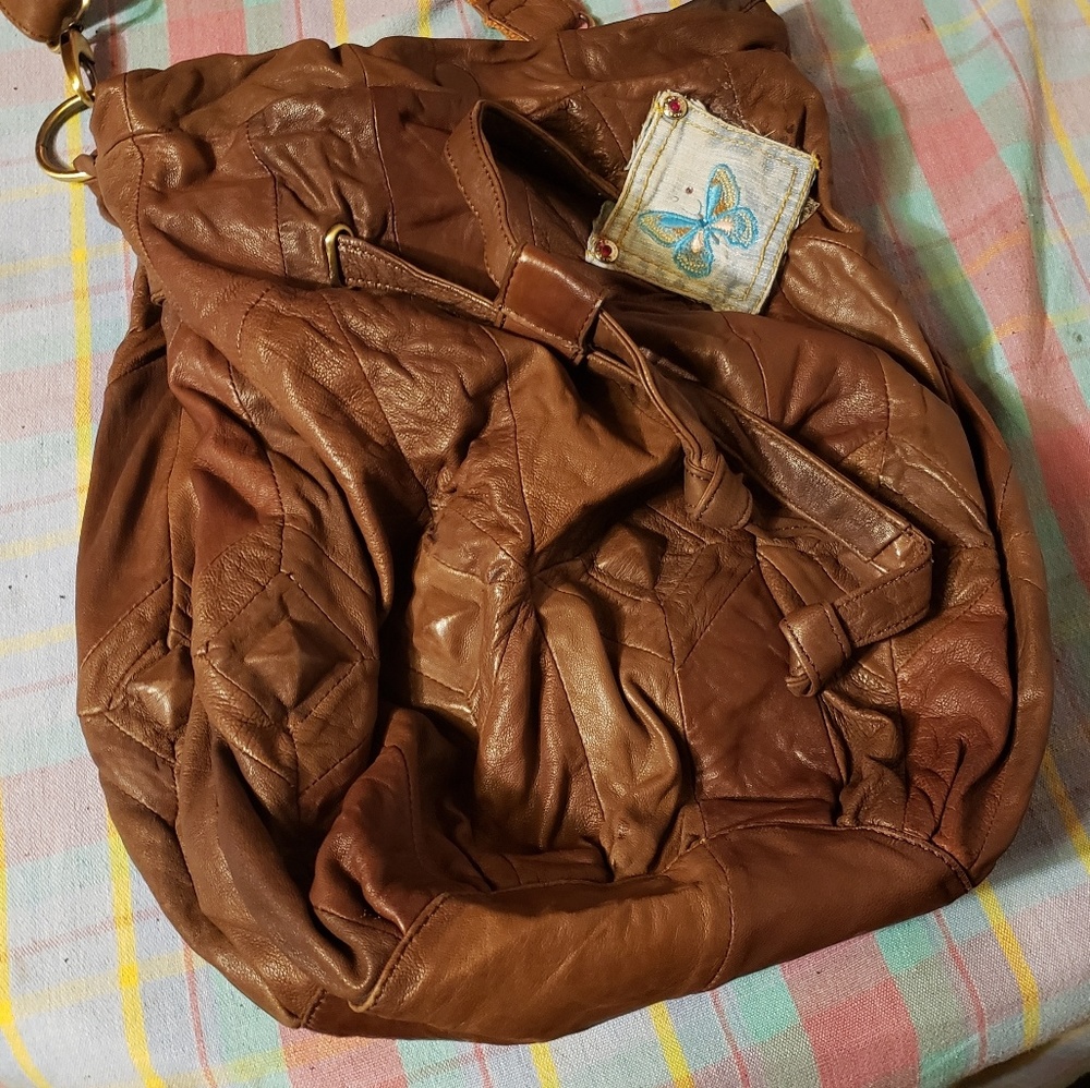 Cross body 7chi drawstrap purse.